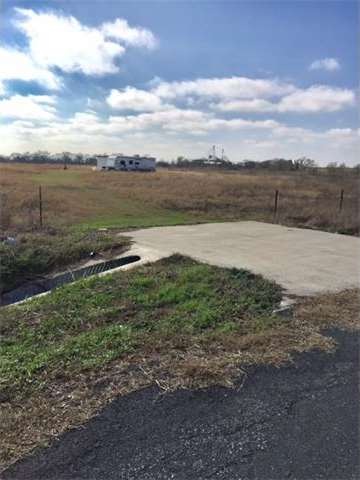 Front of property with nice culvert!  RV does not 