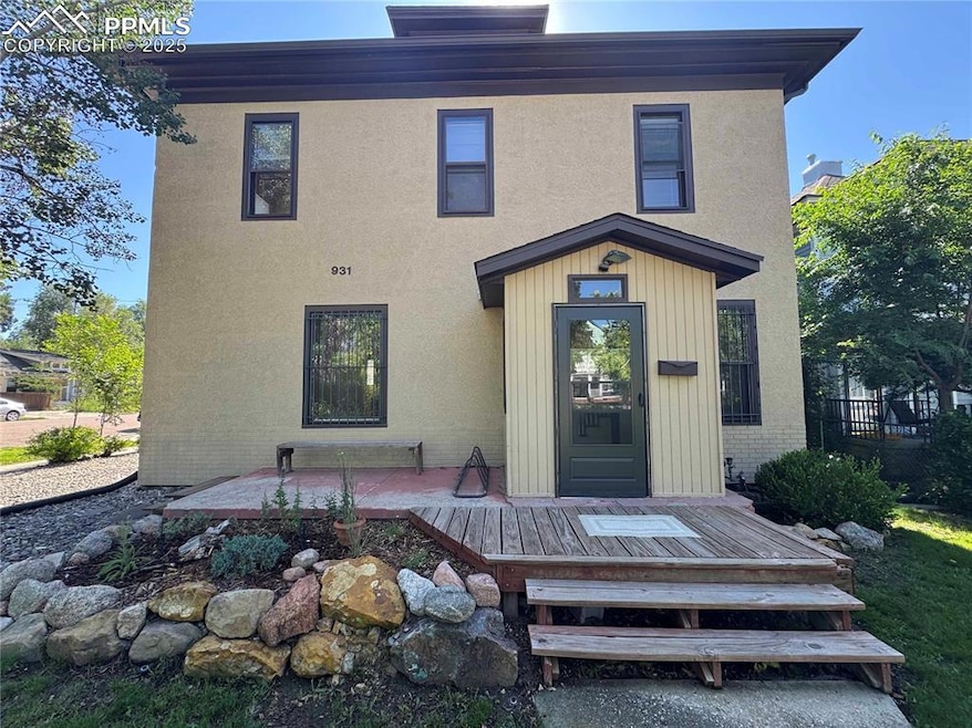 View of front of home with stucco siding