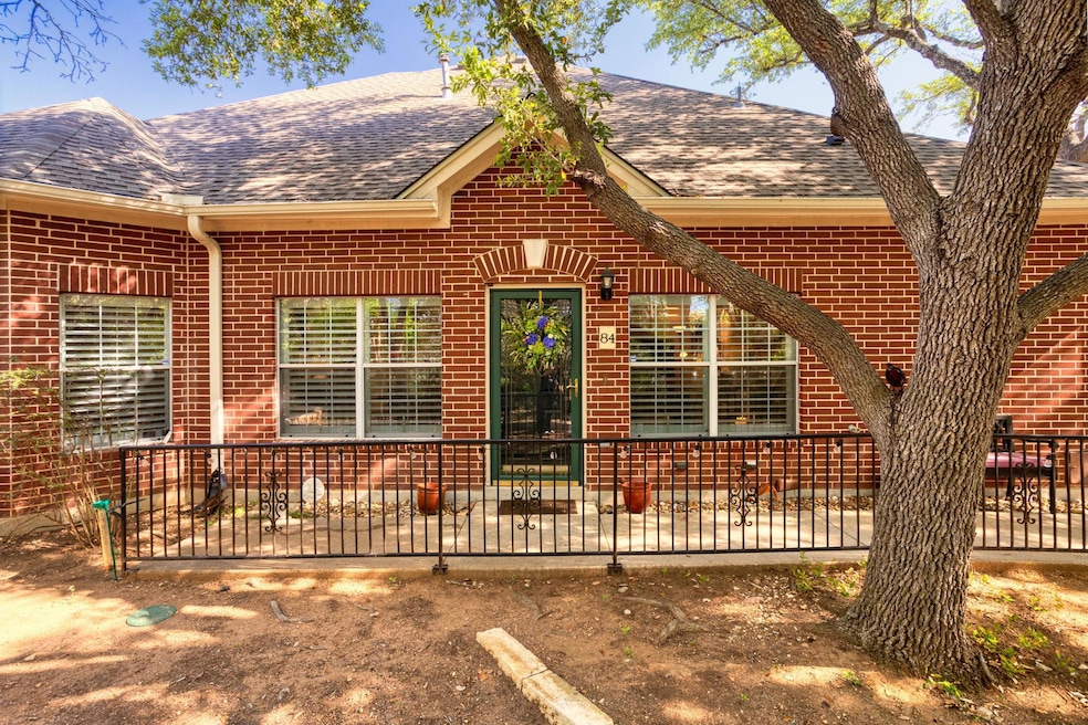 View of front of property featuring brick siding 