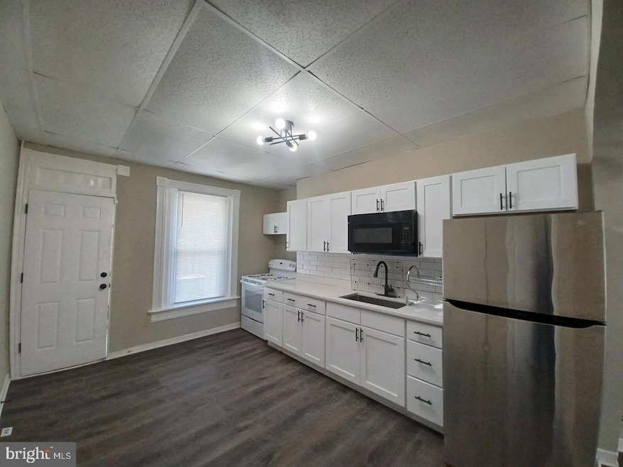 711 N Streeper St, Baltimore, MD 21205 - photo 1