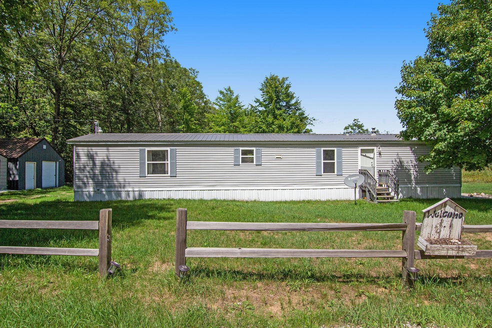 781 W 11 Mile Rd, Bitely, MI 49309 - photo 1