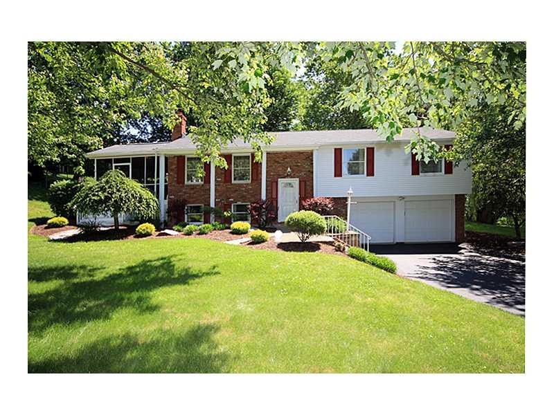Exterior Front. Beautifully situated on a large pr