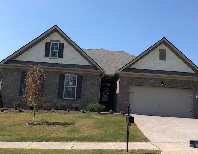 Beautiful All Brick home on corner lot- Popular Ranch floor plan with bonus and bathroom upstairs Actual home