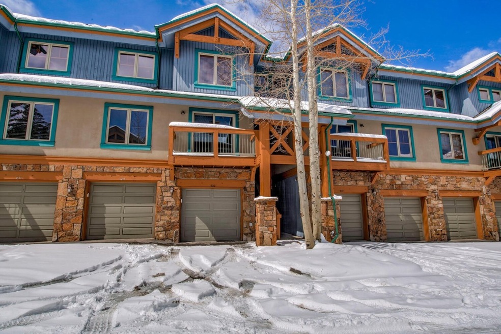 Townhome / multi-family property with a garage and