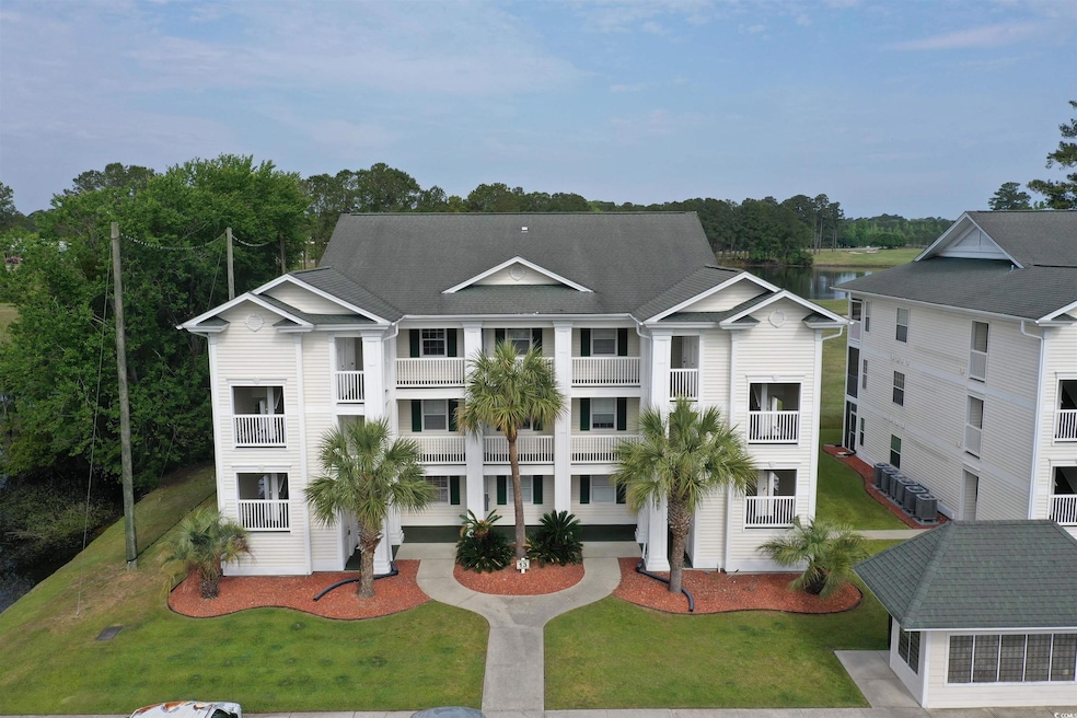 View of property featuring a water view