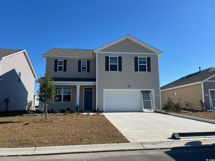 Front of property featuring a garage