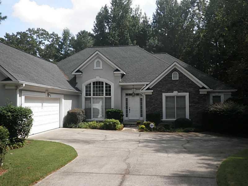 Exterior Front. Ranch with 2+ car garage.  Enough 