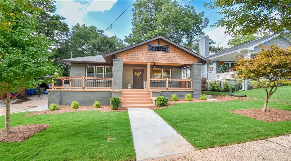 View of front of home with covered porch and a fro