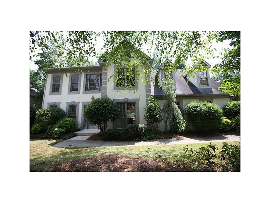 Exterior Front. stucco home sitting in the quiet c