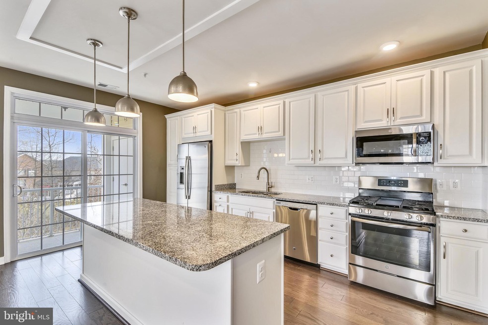 23266 Southdown Manor Terrace unit 101, Ashburn, VA 20148 - photo 1