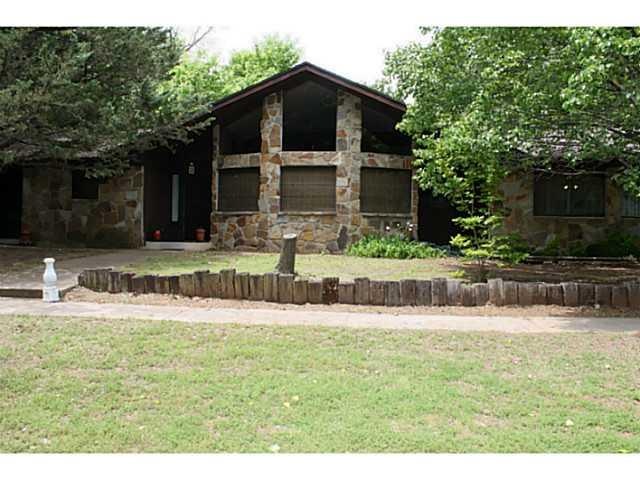 Exterior Front. Home is on 2.4 acres