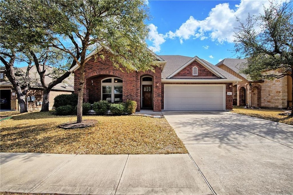 Traditional home featuring an attached garage, br