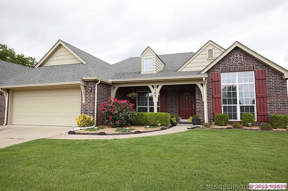 One level home with split floor plan in Jenks Scho