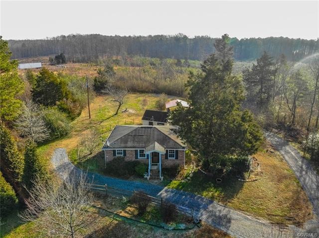 2 Acres surround this Charming Home