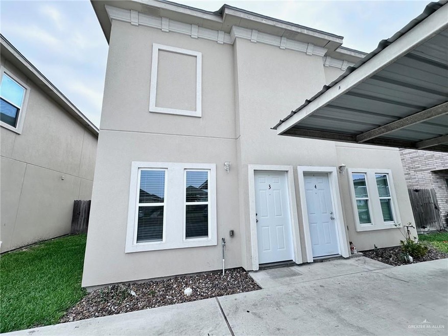 Doorway to property with stucco siding