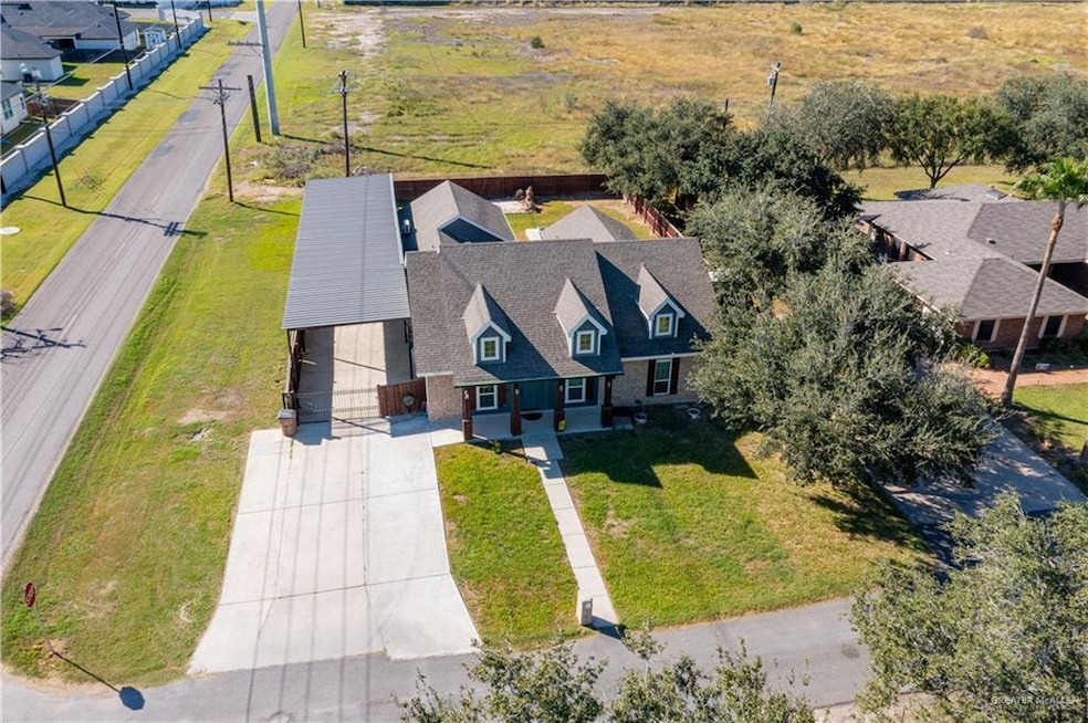 Aerial view of property and surrounding area