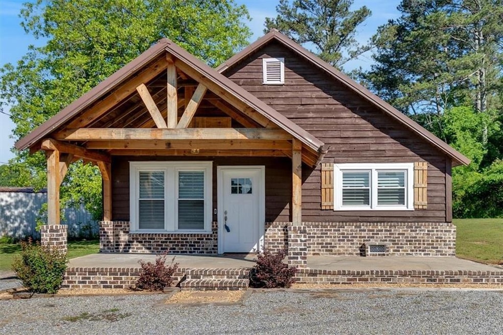View of front of property with brick siding