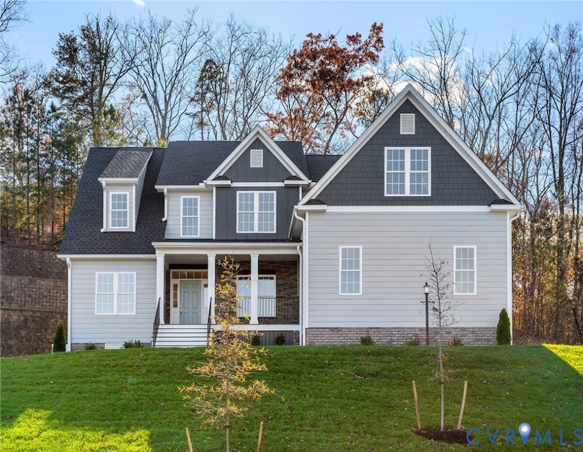 Hardiplank siding and stacked stone.