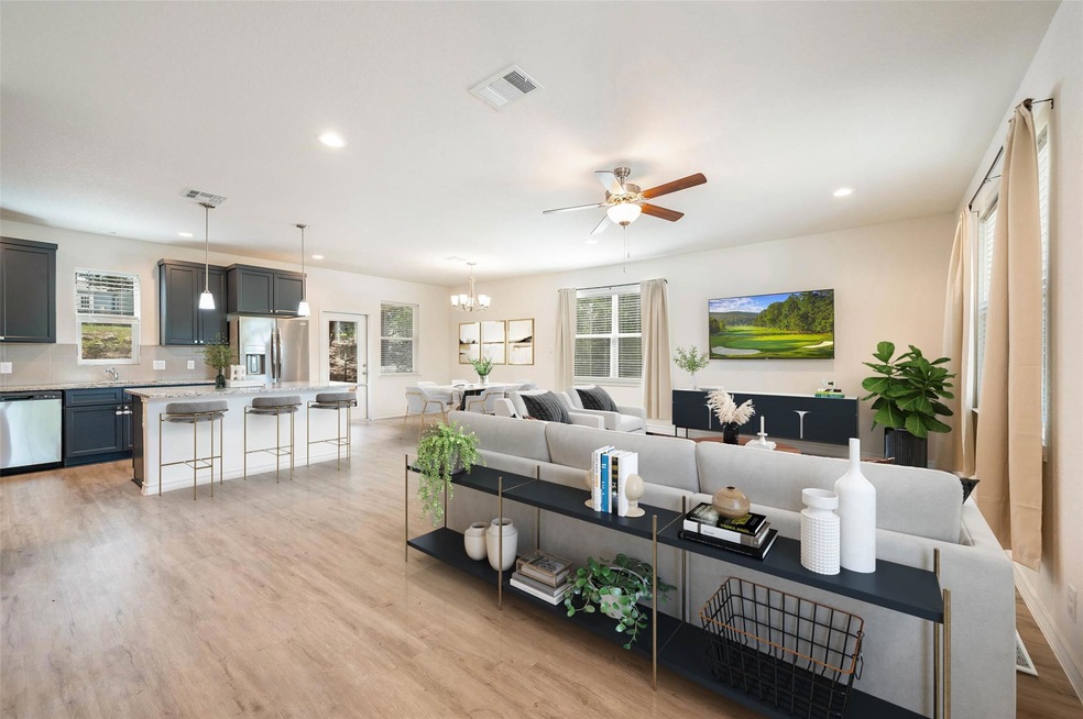 Living room with recessed lighting, light wood-st