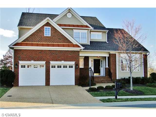 Exterior Front - Brick front villa with Hardiplank