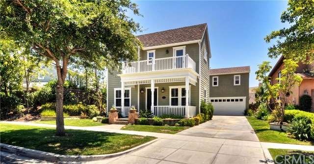 Front of the home with an extra long drive way. Gr