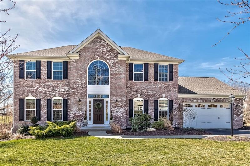 4 Bedroom 3.5 Bath Brick Provincial nestled on a .