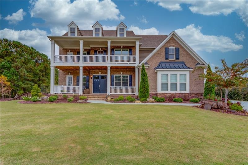 Front Exterior with upgraded double patio elevatio