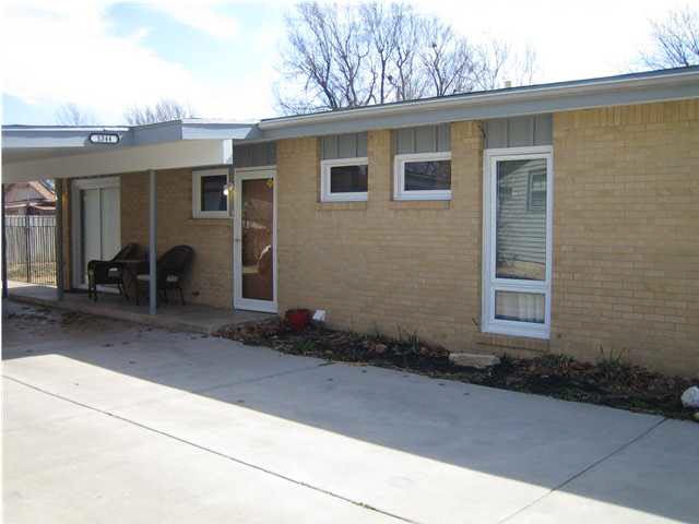 Cute, contemporary brick home