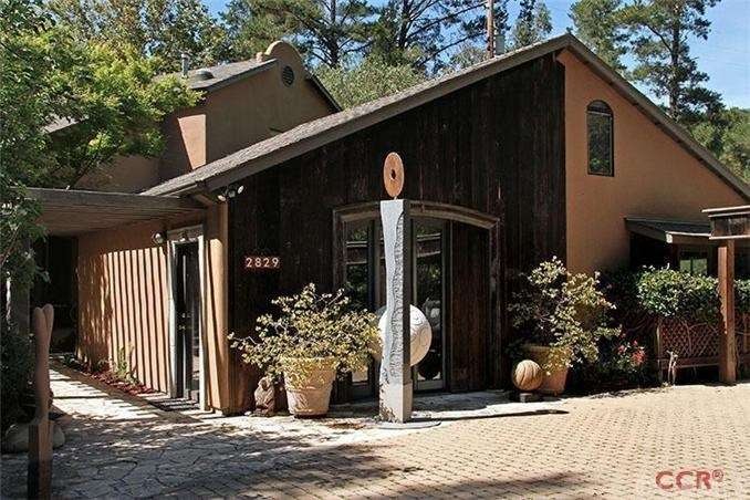 Entrance to property.  Front building is detached 