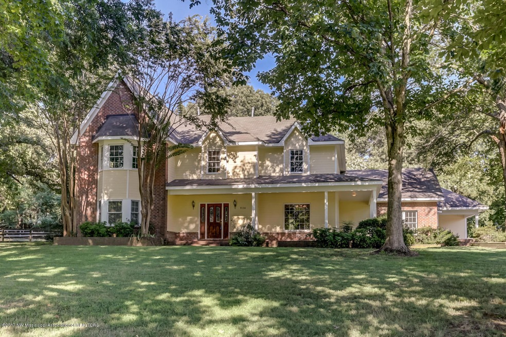 Beautiful, custom home w/ mature trees