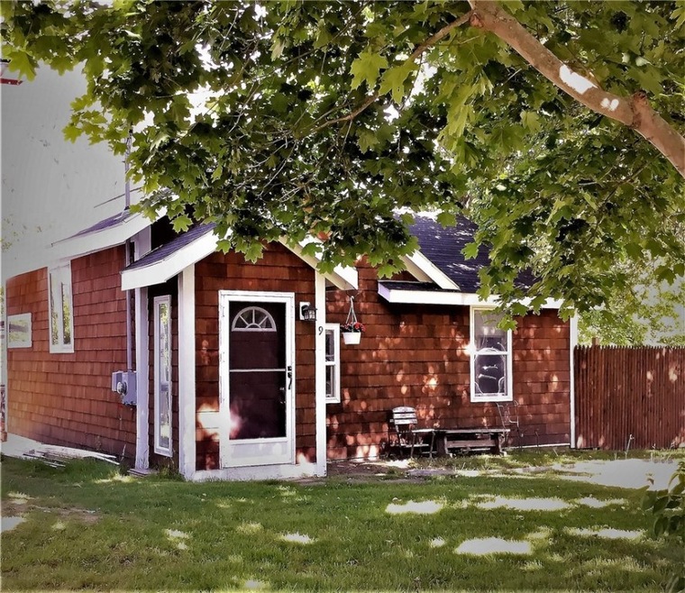 Front, street side, east facing.