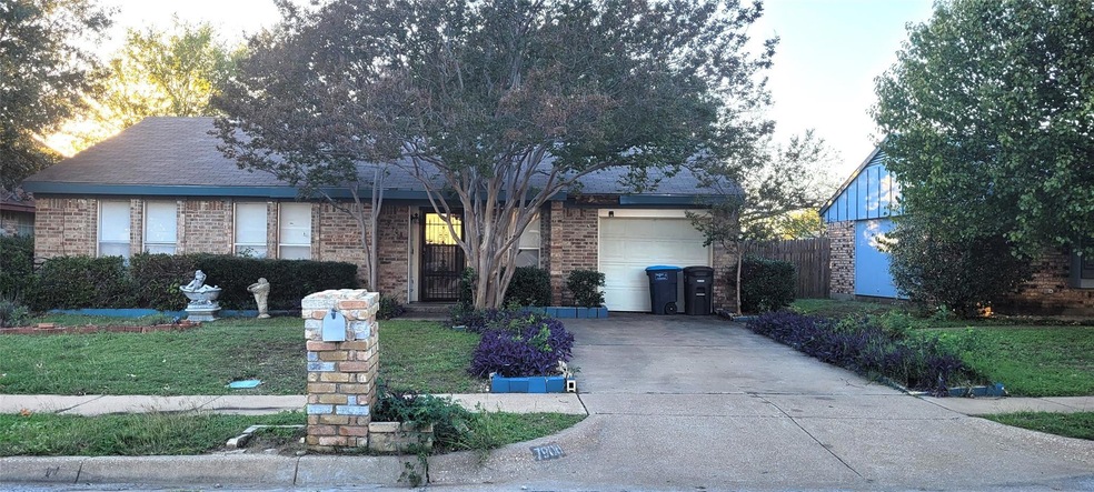Charming 3 bedroom brick home with nice landscapin