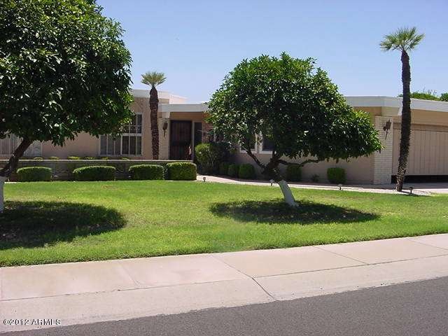 10461 W. LOMA BLANCA DR.