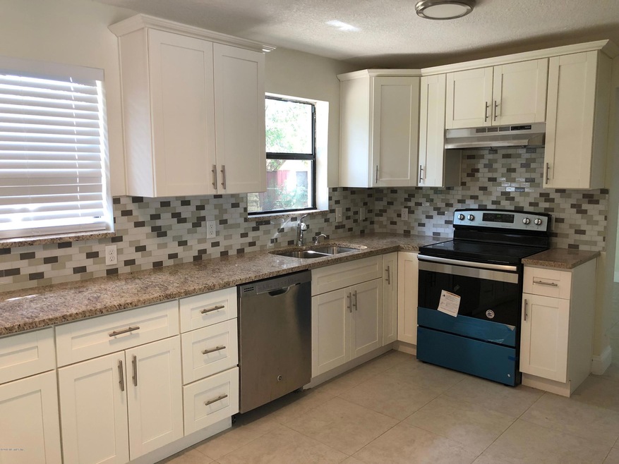 7712 Lazeau Dr, Jacksonville, FL 32211 - photo 1