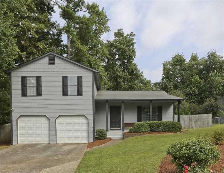 Exterior Front. Charming & newly painted home.