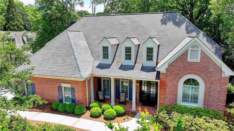 All brick home with covered front porch entrance
