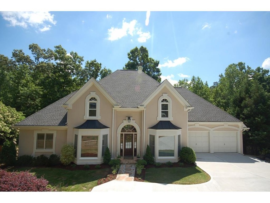 Beautifully updated, spacious, hard coat stucco tr