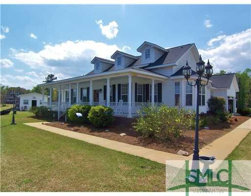 Exterior Front. Beautiful large covered wrap porch