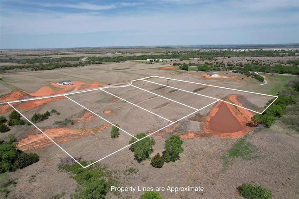 Birds eye view of property featuring a rural view