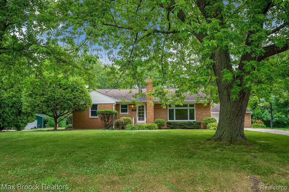 Front of house with large front yard