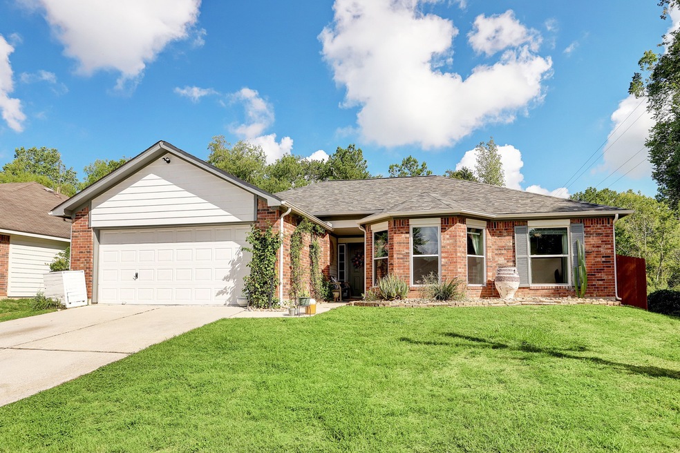 9811 Woodhollow Dr, Conroe, TX 77385 - photo 1