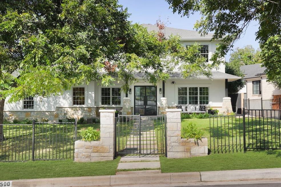 Obstructed view of property with a fenced front y