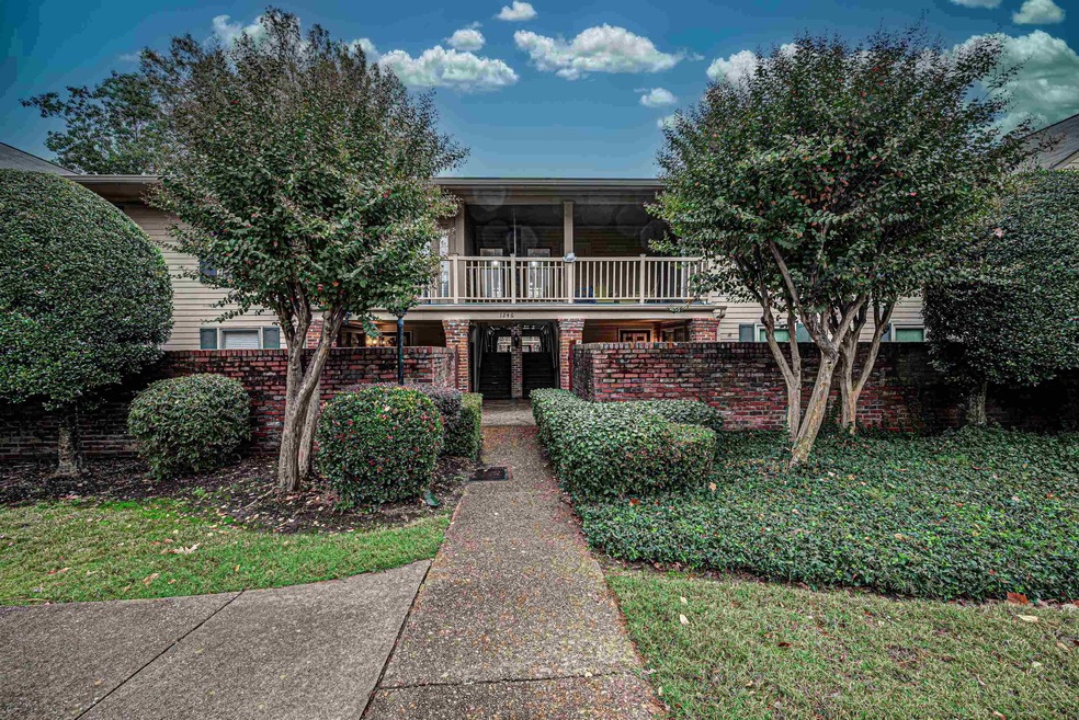 A gated iron fence surrounds this private communit