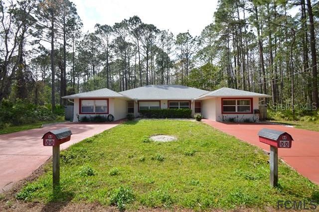 9 Ullock Place unit B, Palm Coast, FL 32164 - photo 1