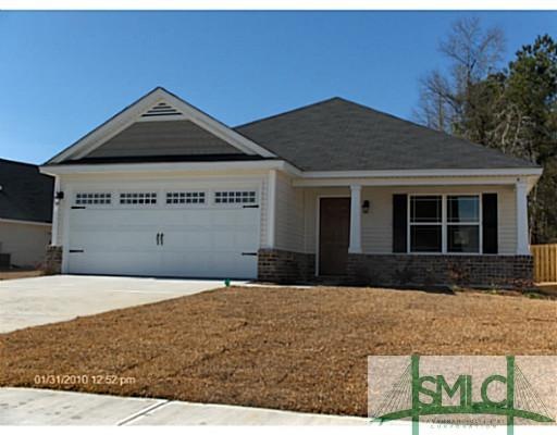 Exterior Front. Cottage Exterior with Brick accent
