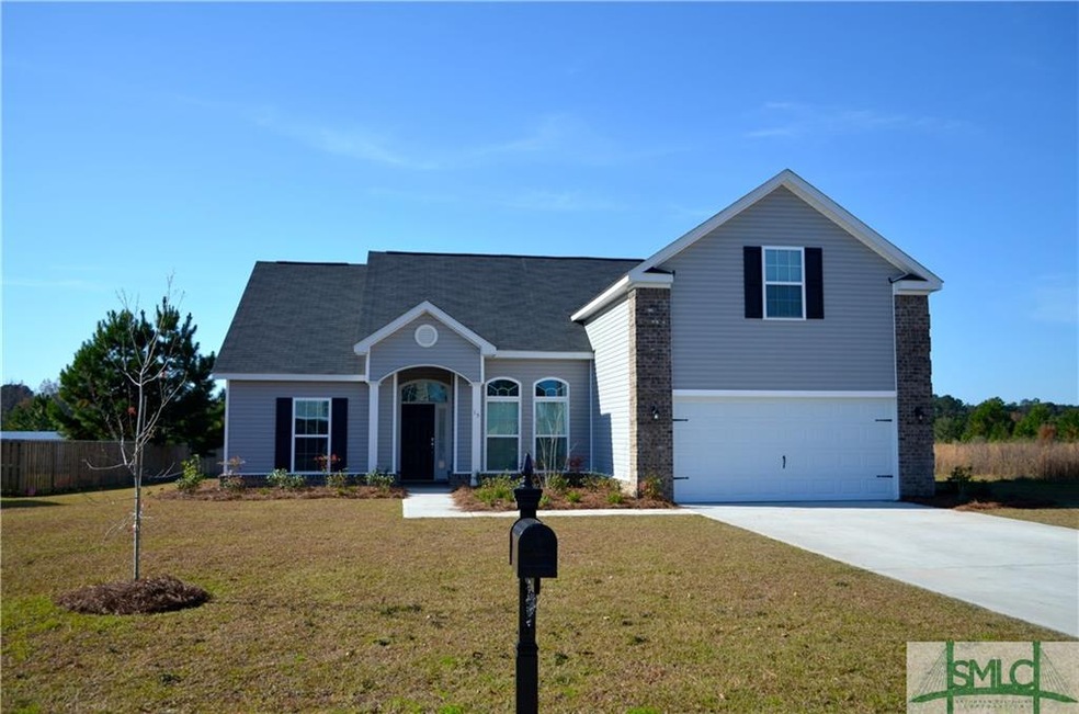 Front Exterior with a splash of brick