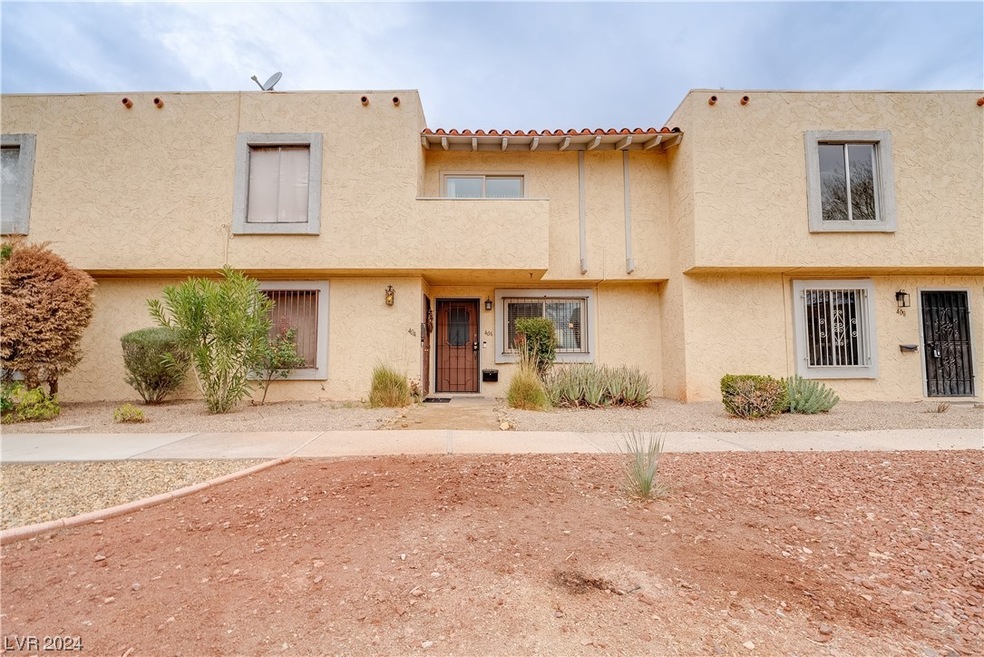 Front Door with desert landscaping