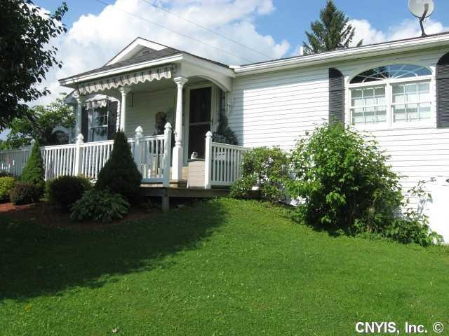 Exterior Front. Side view: Ranch style home w/ a l