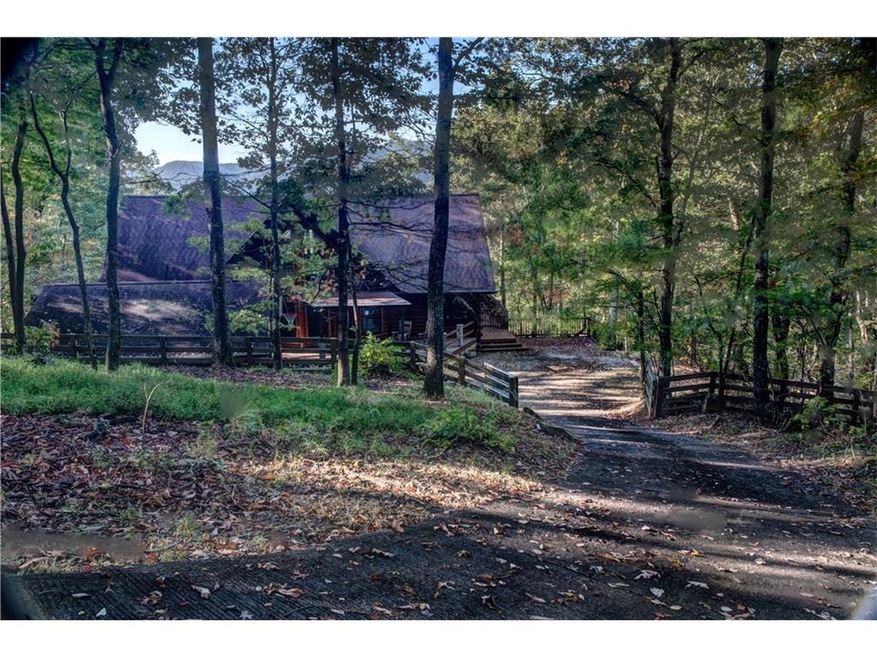 This home is in the middle of three acres