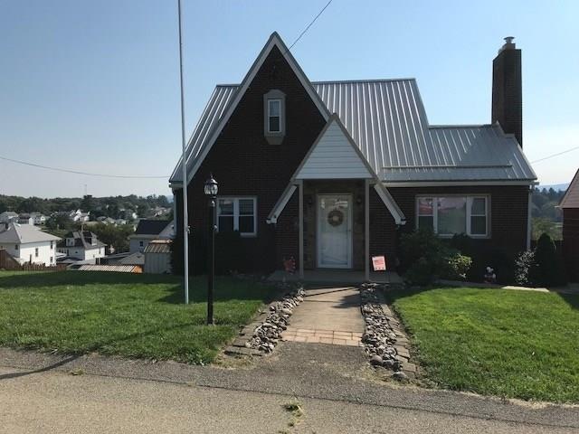 CHARMING BRICK CAPE COD WITH 3 BEDROOMS, 3 BATHROO